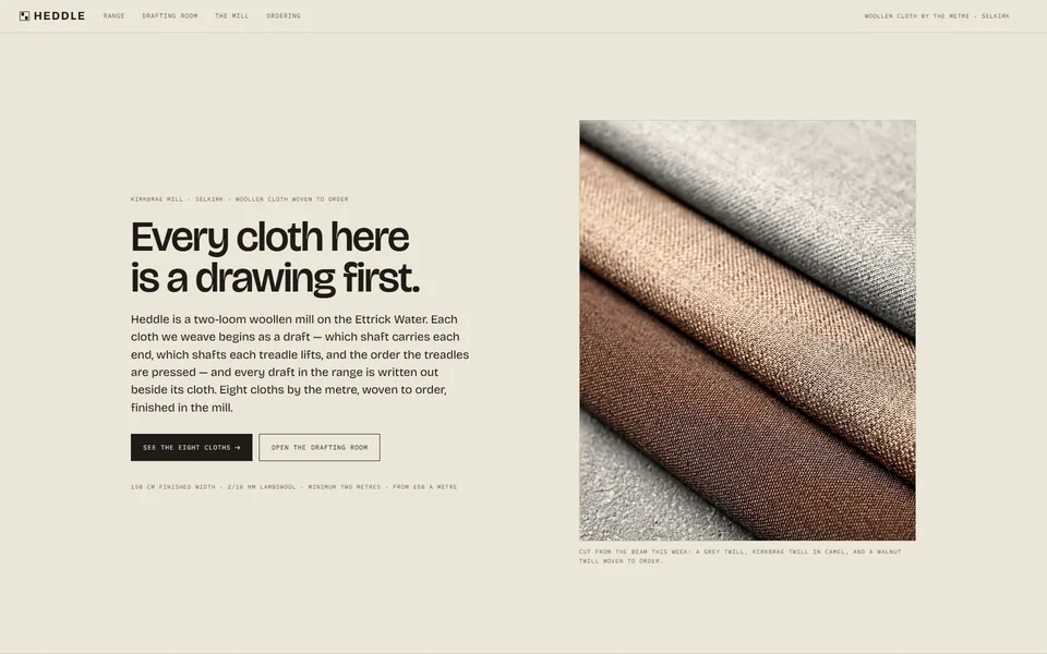 The HEDDLE homepage: the words &lsquo;Every cloth here is a drawing first&rsquo; beside a photograph of three bolts of woollen cloth on undyed-cloth cream.