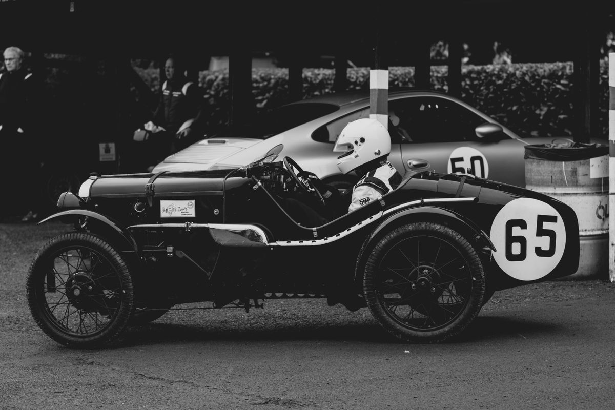 The K8 Double Twelve at a historic circuit, photographed in black and white.