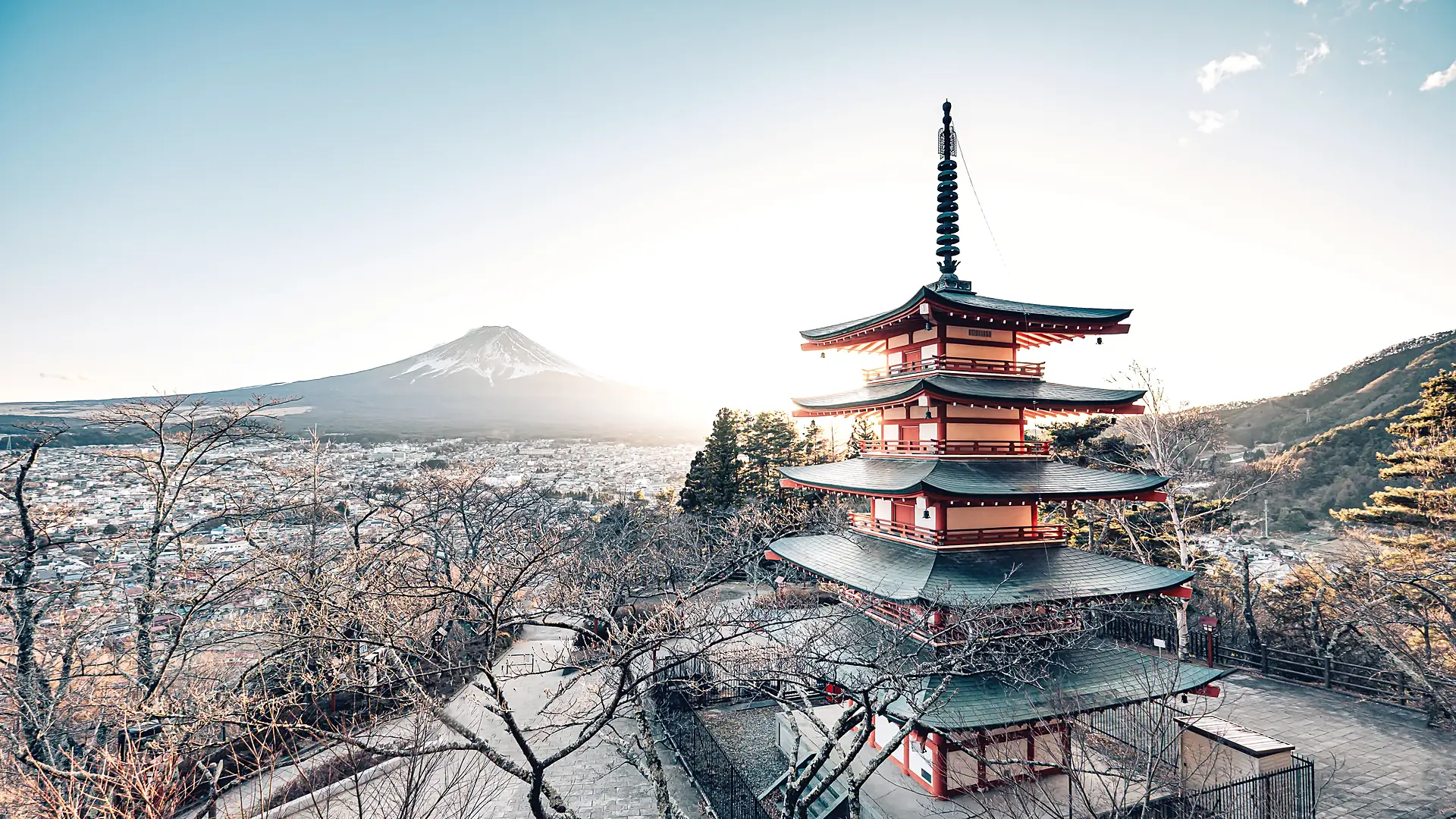 Chureito Pagoda with Mount Fuji behind it at dusk